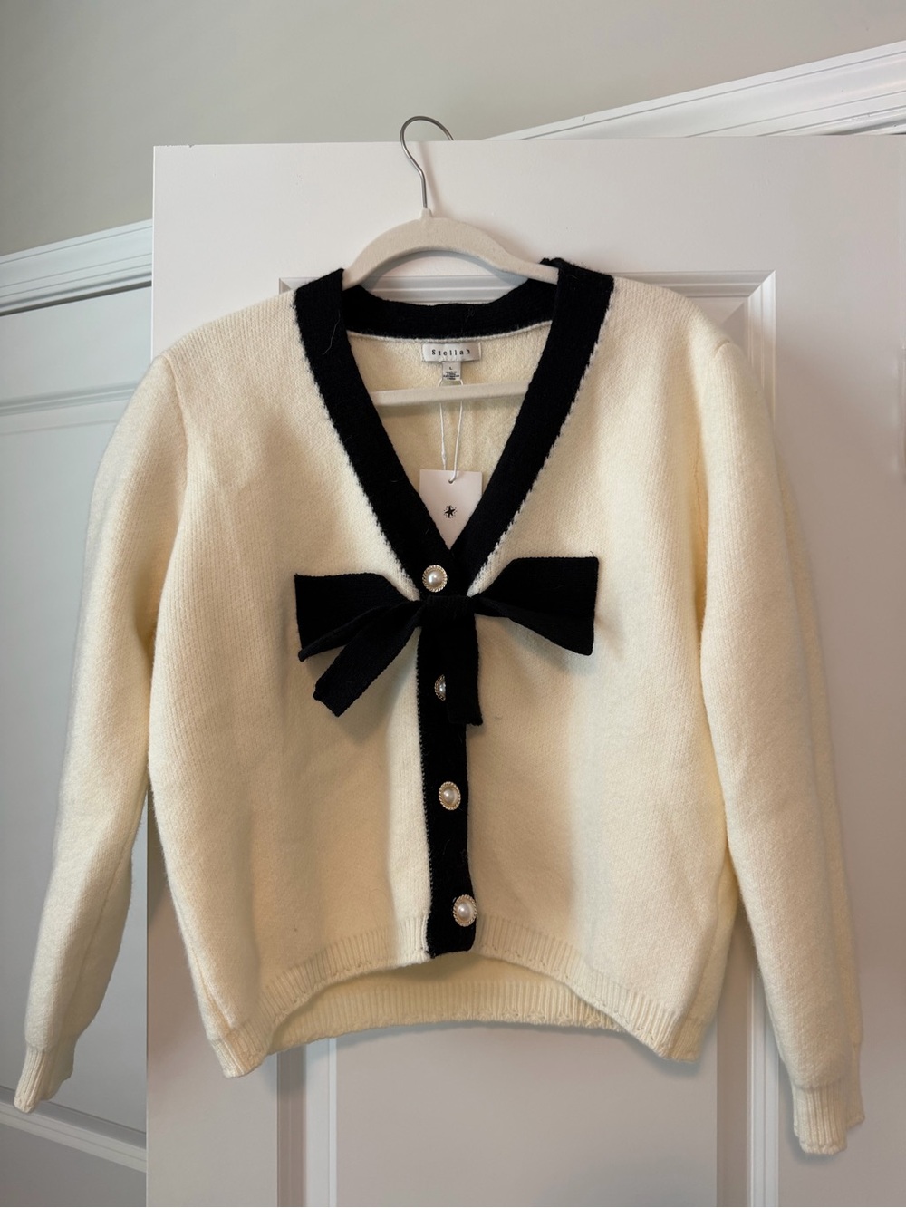 NWT Stellah Cream Sweater with Black Trim & Bow